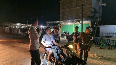 Personil Gabungan Polsek Tanjung Raya dan Sat Pol PP Mesuji Laksanakan Patroli dan KRYD di Simpang Empat Desa Brabasan