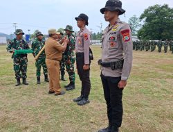 Tandai Siap Kerja! Wabup Mansel Sematkan Pita dan Alat Kerja Kepada Satgas TMMD ke-130 di Ransiki
