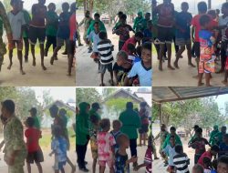 Penuh Keceriaan! Anak-Anak Kampung Yamboi Menari Bersama Persit dan Personel Satgas TMMD ke-130 Kodim 1808/Mansel